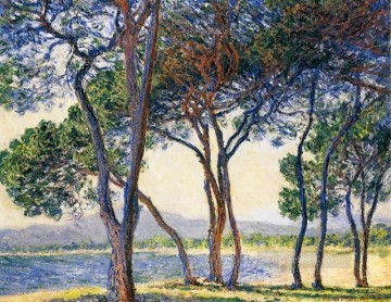 Árboles a la orilla del mar en Antibes Claude Monet Pinturas al óleo